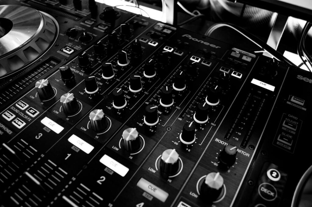 Close-up of DJ equipment highlighting how Suno AI revolutionizes music production as an AI music creator