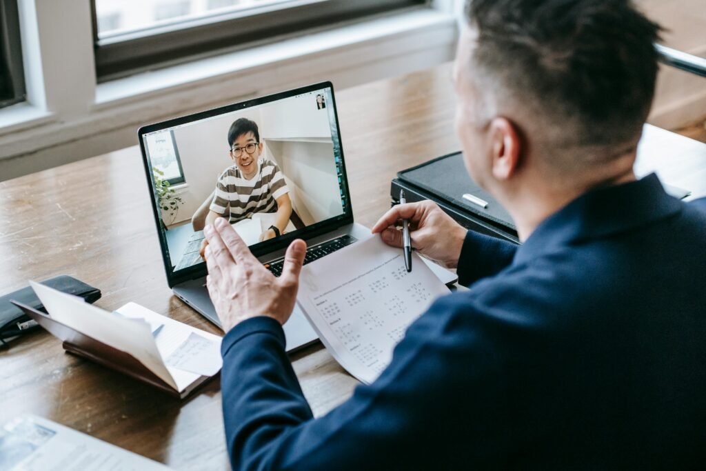 Educator using Filmoras AI tools to create online lessons